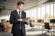 © BillionPhotos.com - Creative, office man hold digital tablet in office