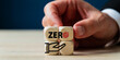 © Omid studio - Zero target concept. Zero of accident, carbon emissions, waste, net zero. Business goal and target achievement. Placed wooden cube with zero target, achievement icon on smart background.