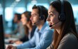 © Daniel - A diverse team of customer service agents wearing headsets works in a modern call center. Professional operators provide technical support and assistance to clients day and night. High quality
