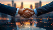 © Shoaib - Strategic partnership handshake against city skyline at sunset symbolizes business success, agreement and global dealmaking in professional setting
