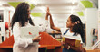 © peopleimages.com - Happy woman, teacher or student with high five in library for education, learning or success. Female person, educator or smile with kid, girl or child for literature, reading or well done in bookshop