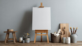 "Indoor scene with an easel holding a blank canvas, surrounded by assorted art supplies on a wooden table by a grey wall."