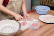 © Mdisk - Hands Preparing Fresh Pork Meat for Healthy Cooking