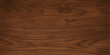 © Jisan - Dark brown natural hardwood floor grain pattern texture background