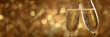 © Keopaserth - Two champagne glass clinking celebration with sparkling bubbles against warm golden bokeh background, festive toast and elegant drink mood