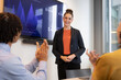 © ReeldealHD images - Team Applauds young employee at Successful Business Presentation