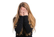 © shahida  - Young blonde girl with long wavy hair covering her face with hands expressing sadness or despair isolated on transparent background