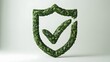 © Muzamil - Green shield symbol made of leaves with a check mark inside symbolizing environmental protection and ecological safety approval
