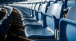 © Warda - Rows of empty blue stadium seats await the fans, creating anticipation and excitement for upcoming games and events at the arena or amphitheater