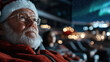 © Milos - An elderly man in a festive Santa hat gazes thoughtfully at twinkling stars while sitting in a cozy chair, surrounded by a warm ambiance and festive lights in the background.