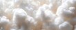 © video - close-up of soft fluffy white cotton balls and fibers evoking cozy warm comfort and calm