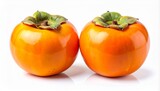 Two fresh, ripe persimmons with green calyxes, isolated on a clean white background, showcasing vibrant orange color and smooth texture.