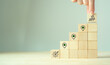 © Parradee - Business progress and project roadmap concept.  Wooden blocks with the icon of  steps in a project or strategic planning process. Waypoint icons and ends with goal achievement.