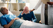© Wess/peopleimages.com - Stress, old people and doctor with bad news in hospital bed for loss, comfort and passing of partner. Grief, medical worker or sympathy to senior husband in clinic for condolences or deceased patient