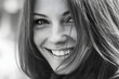 © Studicon - Close up of a beautiful woman with a bright smile in black and white