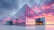 © Stepflow - Modern glass building reflecting a vibrant sunset sky