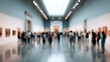 © Nyxoria - Blurred view of people admiring artwork in a spacious, bright art gallery, creating an atmosphere of culture and appreciation, indoor setting.