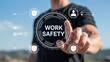 © MediaStockAI - Person interacts with digital display showing concept of workplace protection