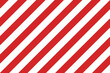 © Sumeth - Seamless striped candy cane pattern for Christmas or New Year decoration. Red and white diagonal stripes background. Christmas gift wrapping paper. Winter holiday gift wrapping paper.