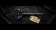 © PhotoArtHub - Decorative metal key with ribbon and paper tag on dark fabric, symbolizing solution or access to opportunity for 2026, perfect for future planning