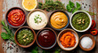 © Leo - Top view of assorted dipping sauces with herbs and spices