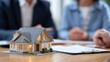 © LimeSky - Conversation with a real estate agent about purchasing a property including discussions on contracts insurance and loans