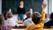 © CreativeArt - Child raising hand in classroom, actively participating in primary school education and learning from teacher