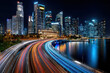 © YouraPechkin - Illuminated Cityscape with Light Trails from Traffic at Night