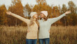 © rohappy - Happy young women friends having fun in autumn park, girlfriends together outdoors