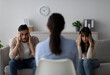 © Prostock-studio - Psychologist sits facing young arab couple who are struggling with relationship problems. The couple appears frustrated while seeking guidance to resolve their conflicts and improve communication.