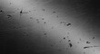 © vadosloginov - Scratched metal surface with water droplets texture background
