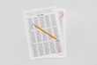 © Pixel-Shot - Pencil and answer sheets form of school test with results on white background