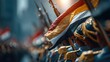 © Oulaphone - A vibrant parade scene featuring soldiers in uniform, proudly displaying flags against a blurred backdrop.
