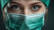 © Prapan - Focused Care: A dedicated medical professional is seen gazing intently, wearing a surgical mask and cap, with the eyes reflecting compassion, strength and a unwavering commitment to healthcare.