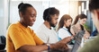 © DavidsPrime/peopleimages.com - Classroom, university and students on tech for learning, studying and education at college. School, academy and people on tablet for research, website and internet for project, lesson and assignment