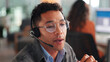 © FlexOn/peopleimages.com - Man, headset and talk for consultation in call centre for customer service, online query and billing. Male agent, explaining and consulting for payment plan, assistance and advice for refund request