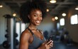 © ning - Fitness, woman and phone blog for live stream exercise at gym on platform or app. Influencer, training or health vlog with black person or coach talking to social media or virtual audience with light