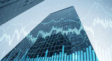 low-angle view of a corporate skyscraper is overlaid with blue and white stock market graphs and trading charts, representing financial technology and economic data.