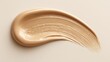 © Neon Stock - Beige liquid foundation smear on beige background for beauty and makeup concept