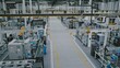 © Framestock - Automated Factory Floor With Robots. Modern Automated Factory Floor Shows Multiple Robotic Arms and Conveyor Belts Working Synchronously. Concept of Industry 4.0, Advanced Manufacturing. High Angle.