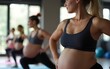 © Laura - Group of pregnant women practicing yoga in gym, closeup. High quality