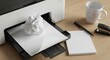 © MDJohrul - Printer Paper Jam with Coffee Mug and Supplies crumpled paper