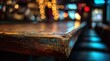 © Pawon.STD - Close up of rustic wooden bar top with colorful bokeh lights background