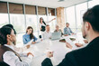 © deagreez - Diverse team of professionals collaborating in a modern office meeting for project development discussion and teamwork