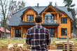 © Александр Марченко - Man looking at new home construction dream house