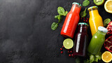 Colorful array of fresh fruit and vegetable juices in glass bottles with fresh ingredients on a dark textured background, perfect for healthy lifestyle and nutrition-themed content