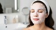 © Tiaga - Skin Care. Beautiful Girl With Sheet Mask on Her Face