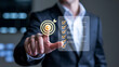 © Rakib Rakib - Business man achieving goals through digital target checklist and virtual interface achieving success