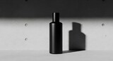 Sleek Black Product Bottle on Minimalist Concrete Stage with Dramatic Shadow