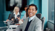 © FlexOn/peopleimages.com - Portrait, man and lawyer in boardroom with smile for legal aid, labor law and legislation compliance. Happy, person and team in office for advocacy meeting, employment rights or constitution advice.